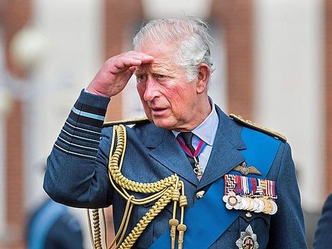 In this file photo taken on July 16, 2020 Marshal of The Royal Air Force, Britain's Prince Charles, Prince of Wales gestures as he talks to cadets after the Graduation Ceremony of the Queen’s Squadron and Sovereign’s Review at RAF College Cranwell in eastern England.