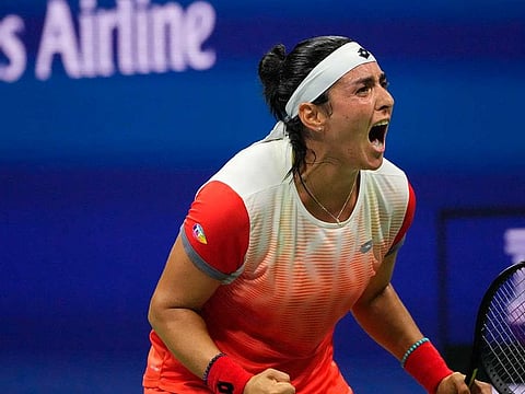 Ons Jabeur (Tunisia) celebrates after match point against Caroline Garcia (France (not pictured) on day eleven of the 2022 U.S. Open tennis tournament at USTA Billie Jean King Tennis Center.