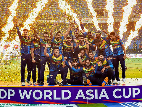 Sri Lanka celebrate with the trophy after winning the DP World Asia Cup 2022 final by defeating Pakistan by 23 runs at Dubai International cricket stadium.
