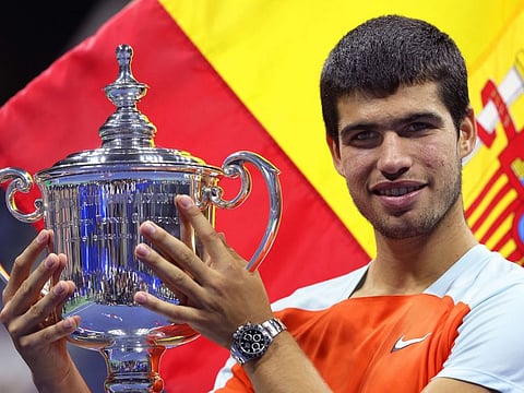 Carlos Alcaraz of Spain celebrates with the winners trophy after defeating Casper Ruud of Norway during their Mens Singles Final match of the 2022 US Open in New York City.