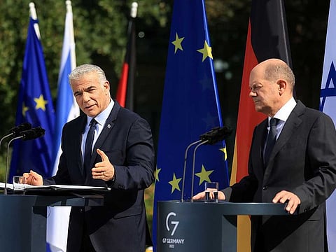 Yair Lapid, Israel's prime minister, left, and Olaf Scholz, Germany's chancellor, during a news conference at the Chancellery in Berlin, Germany, on Monday, Sept. 12, 2022.