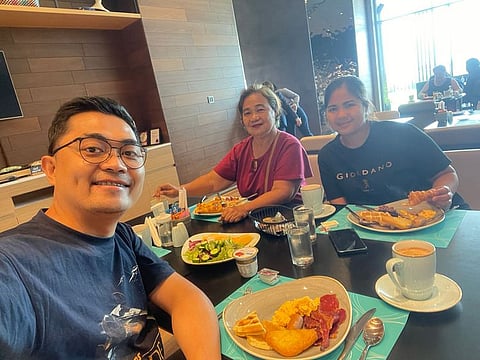 Cris Gudia with his mother after their reunion in Dubai