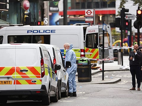 Forensic officer works at the scene where two policemen were stabbed, near Leicester Square, in London, on September 16, 2022.