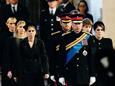 Queen Elizabeth II 's grandchildren (L-R) Zara Tindall, Britain's Lady Louise Windsor, Britain's Princess Beatrice of York, Britain's Prince Harry, Duke of Sussex,, Britain's Prince William, Prince of Wales, James, Viscount Severn and Britain's Princess Eugenie of York arrive to hold a vigil.