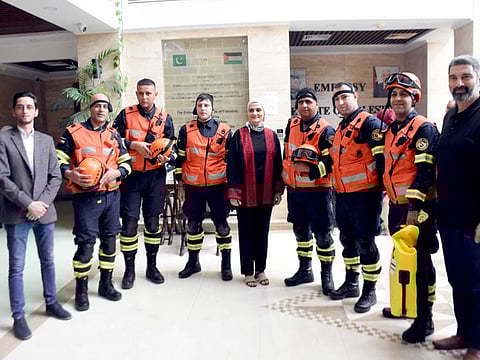 Members of the Rapid Response and Rescue Team of Palestine at the embassy of Palestine prior to moving to the flood-affected areas.