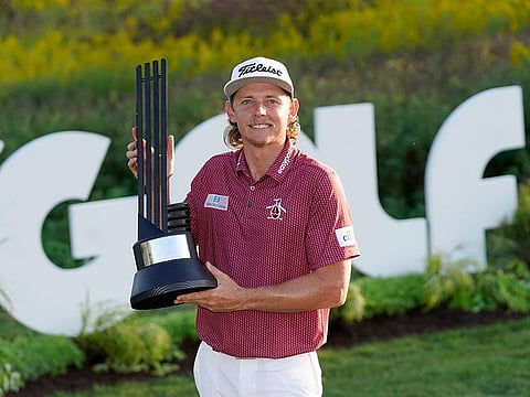 Cameron Smith poses with the champion's trophy after winning the LIV Golf Invitational-Chicago tournament in Sugar Hill, Ill.