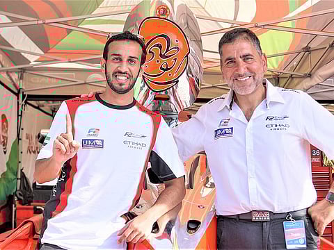 Mansoor Al Mansoori (left) the new F2 world champion with Team Abu Dhabi manager Guido Cappellini.