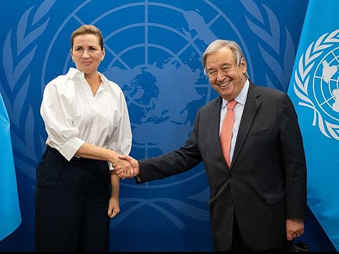 This UN handout image shows Danish Prime Minster Mette Frederiksen (L) shaking hands with UN Secretary General Antonio Guterres during a bilateral meeting in New York on September 19, 2022.