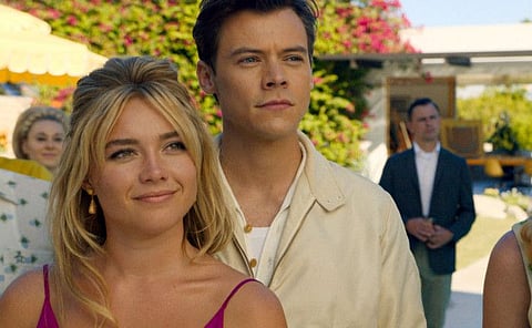 Florence Pugh, left, and Harry Styles in “Don’t Worry Darling.”
