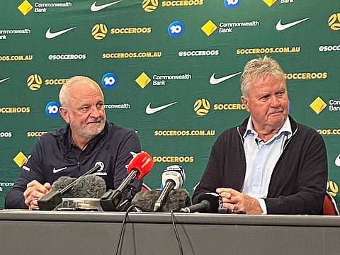 Australia coach Graham Arnold (left) with former coach Guus Hiddink.