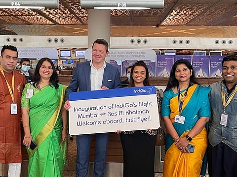 An IndiGo team at Mumbai airport welcoming passengers ahead of their flight to Ras Al Khaimah.