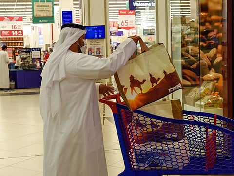 Adnan Al Hosani carrying re-usable bags for grocery as ban on single use plastic bags comes to effect in Abu Dhabi  Photo: Virendra Saklani/Gulf News