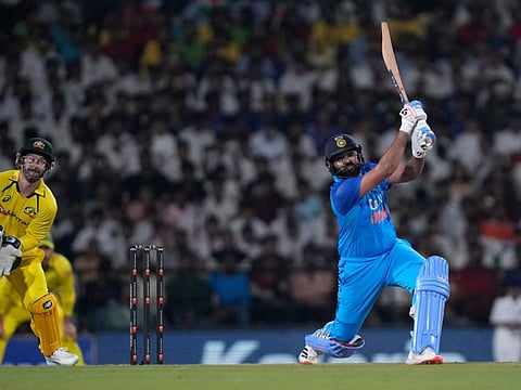 India's captain Rohit Sharma (right) plays a lofted cover drive during his unbeaten 46 against Australia in the truncated Twenty match at Nagpur.