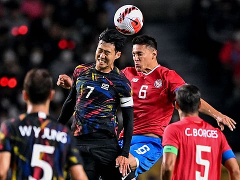 South Korea's Son Heung-min (left) fights for the ball with Costa Rica's Oscar Duarte during their international friendly in Goyang on Friday.