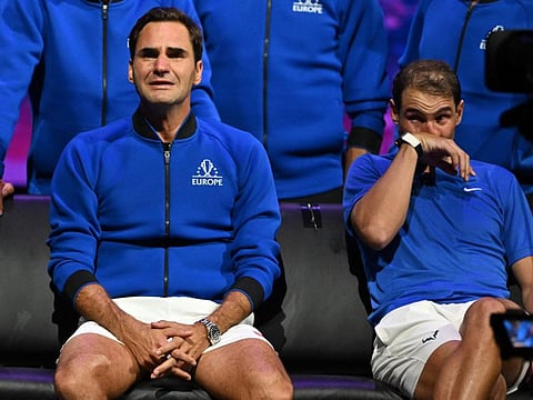 Switzerland's Roger Federer (left) sheds a tear after playing his final match, a doubles with Spain's Rafael Nadal of Team Europe against USA's Jack Sock and USA's Frances Tiafoe of Team World in the 2022 Laver Cup at the O2 Arena in London.