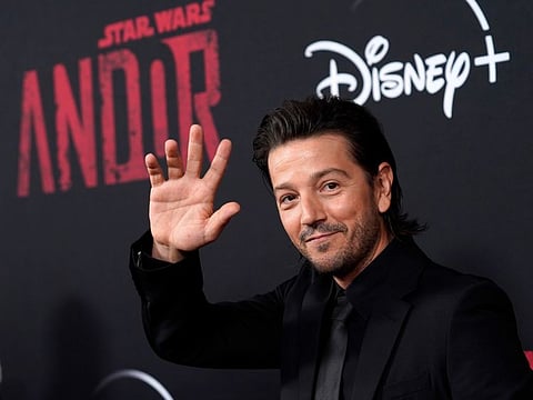 Diego Luna, a cast member in "Andor," waves at a launch event for the Disney+ streaming series, Thursday, Sept. 15.