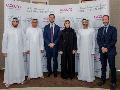 Representatives from Emirates Foundation and Accuro during the agreement signing ceremony