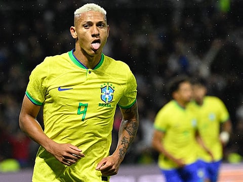 Brazil's forward Richarlison celebrates after scoring during the friendly match against Ghana at the Oceane Stadium in Le Havre, northwestern France.