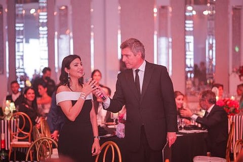 Art be a Part founder Medha Nanda with MC and auctioneer Tom Urquhart.