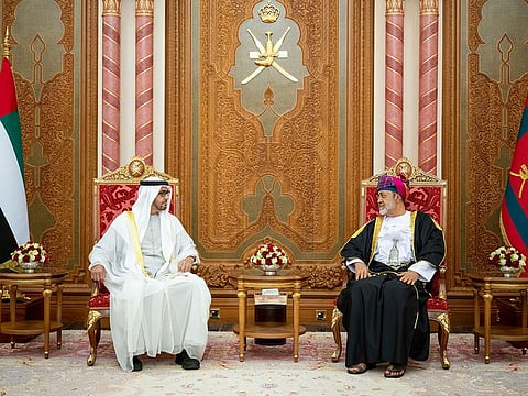 Sheikh Mohamed is received by Sultan Haitham bin Tariq upon arriving at the Royal Flight of Oman commencing a state visit.