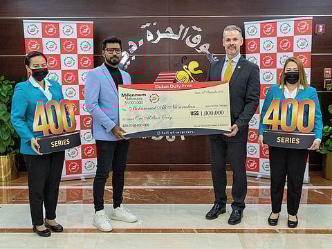 Prior to the Millennium Millionaire draw, a presentation to the previous winner of $1 million in Milestone Series 400 - Mohammed Nazarudeen, seen here - took place at the Dubai Duty Free Head Office in Ramool