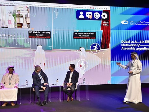 Abdulla bin Touq Al Marri (right), UAE Minister of Economy, during the launch of the ministry's metaverse office at Dubai Metaverse Assembly at Museum of the Future in Dubai