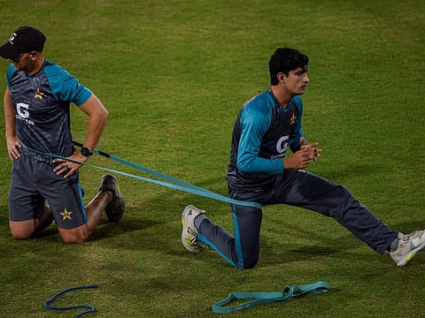 Pakistan's Naseem Shah (right) has tested positive for COVID-19 and will miss the T20 clash against England tomorrow.