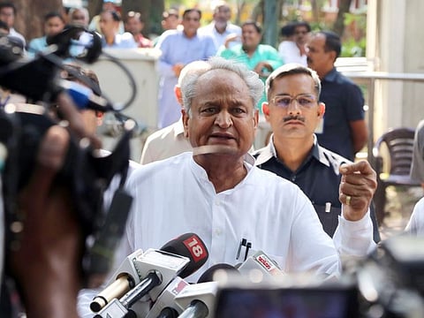 Rajasthan Chief Minister Ashok Gehlot addresses the media after meeting with Congress interim President Sonia Gandhi, outside her residence, in New Delhi on Thursday, September 29, 2022.