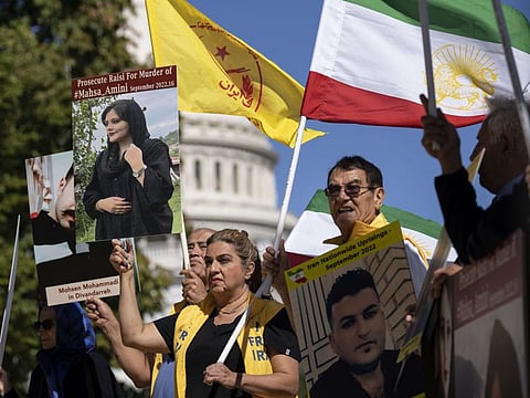 Iranian Americans rally to denounce the death of Mahsa Amini, on Capitol Hill on September 28, 2022 in Washington.