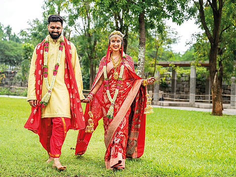 Bride Ankita wears a Asha Gautam bridal saree on her wedding day