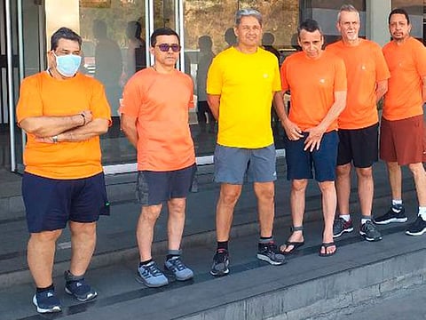 This undated file photo posted on Twitter on June 18, 2020, by Venezuela's Foreign Minister Jorge Arreaza, shows CITGO oil executives Jose Angel Pereira, from left to right, Gustavo Cardenas, Jorge Toledo, Jose Luis Zambrano, Tomeu Vadell and Alirio Jose Zambrano, standing outside the Bolivarian National Intelligence Service, in Caracas, Venezuela.
