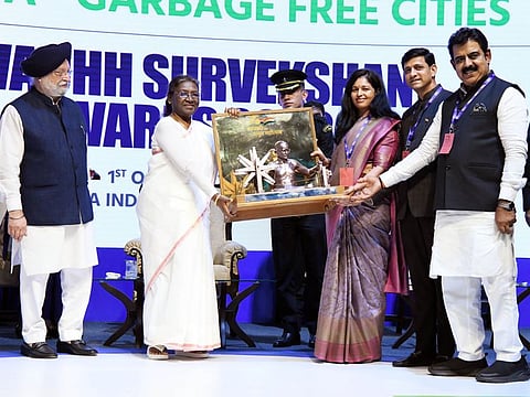 President Droupadi Murmu presents the Swachh Survekshan Award 2022 to Indore at Talkatora Stadium, in New Delhi, on Saturday.