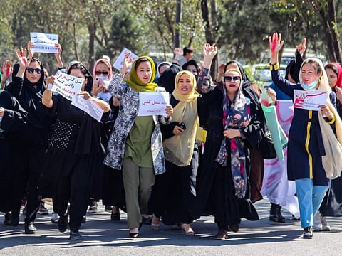 Afghan women protest a day after a suicide bomb attack at Dasht-e-Barchi learning centre, in Kabul, on October 1, 2022.