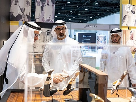 Sheikh Khaled bin Mohamed bin Zayed Al Nahyan (center) during his visit to ADIHEX