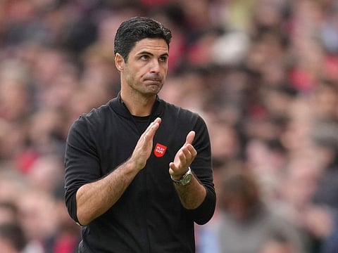 Arsenal's manager Mikel Arteta applauds fans at the end of the English Premier League against Tottenham Hotspur, at Emirates Stadium, in London, England.