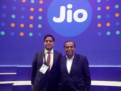 Reliance Industries chairman Mukesh Ambani with son Akash Ambani, chairman of Jio.