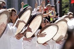 Performers play the daf, a Persian tambourine, at a Freedom Rally for Iran, protesting in support of Iranian women and against the death of Mahsa (Zhina) Amini, outside City Hall in Los Angeles, California, US, October 1, 2022.