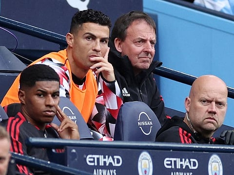 Manchester United's Cristiano Ronaldo on the substitutes bench during the derby against Manchester City at the Etihad Stadium, Manchester, Britain.
