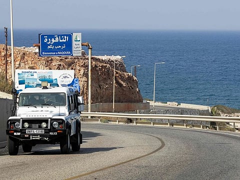A United Nations peacekeeping force (UNIFIL) vehicle drives on the coastal road to Naqura, the southernmost Lebanese town by the border with Israel, on October 3, 2022.