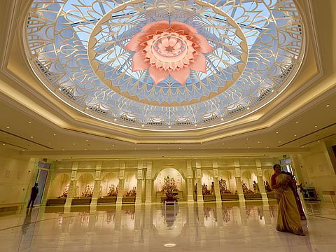 With a blend of Indian and Arabic architecture, the temple, which has 16 deities, houses a huge prayer hall that has a large 3D-printed pink lotus unfurling across the central dome. It also houses the Guru Granth Sahib, the holy book of the Sikhs.