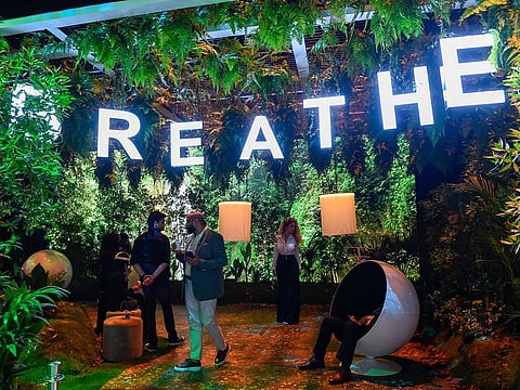 Delegates enjoying greenery on the sidelines of the Arab Media Forum in Dubai on Wednesday