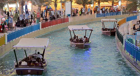 File photo of abra boats at Global Village