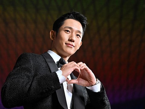 South Korean actor Jung Hae-in walks on the red carpet during the opening ceremony of the 27th Busan International Film Festival.
