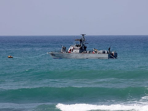 An Israeli navy vessel patrols Mediterranean waters off the coast of Rosh Hanikra, known in Lebanon as Ras Al Naqura, an area at the border between the two countries, on October 4, 2022.