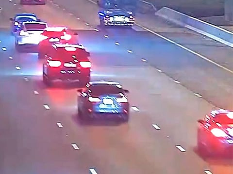 Screen grab from the Abu Dhabi Police video showing hazards for lane swerving