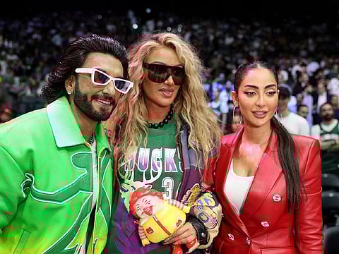 Star power... Ranveer-Singh (left) Maya Diab (centre) and Noor Ghandour were at the Etihad Arena, Abu Dhabi, to watch the first NBA Games in the UAE.