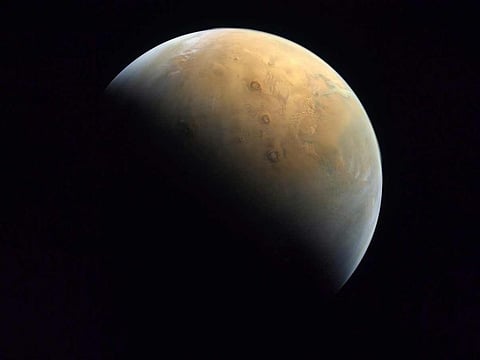 File photo: This image captured by the United Arab Emirates' "Amal" ("Hope") probe shows the planet Mars on February 10, 2021.