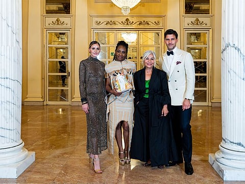 Desiree Bollier and the three finalists: Olivia Palermo, Nkwo Unkwa, and Johannes Huebl.