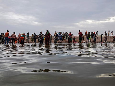 Ethiopian migrants walk on the shores of Ras Al Ara, Lahj, Yemen, after disembarking from a boat, on July 26, 2019. The UN said on Oct. 11, 2022, it returned 129 Ethiopian migrants stranded in war-torn Yemen to their homeland in its first humanitarian repatriation flight to depart from the capital of Sana'a this year.
