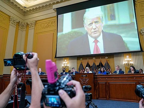 President Donald Trump is seen on the screen as the House select committee investigating the Jan. 6 attack on the U.S. Capitol holds a primetime hearing on Capitol Hill earlier this year in Washington, DC.